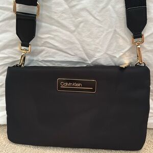 Calvin Klein brand new black handbag. Gold accents.